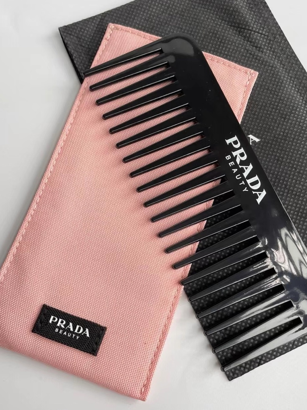 Prada beauty Black Wide-Tooth Comb with Pink Sleeve